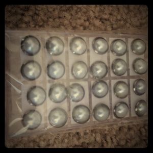 12 pairs of pearl earrings